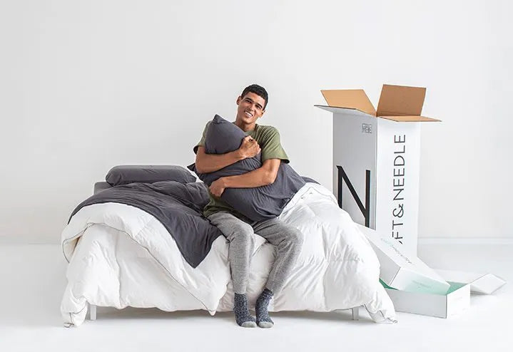 Happy guy with his Tuft and Needle mattress